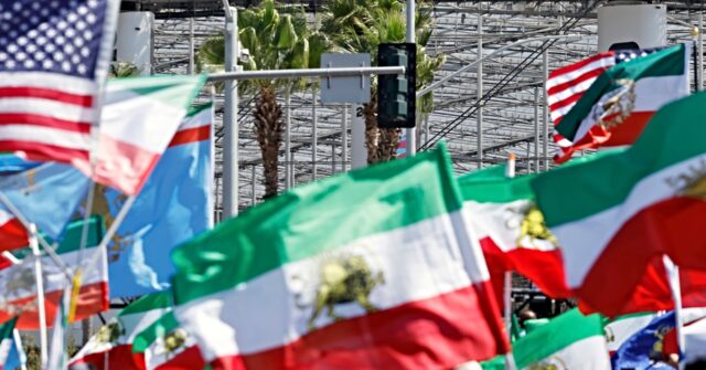 Video: Iranian Supporters Challenge FIFA Authorities and Wave Historic Flags