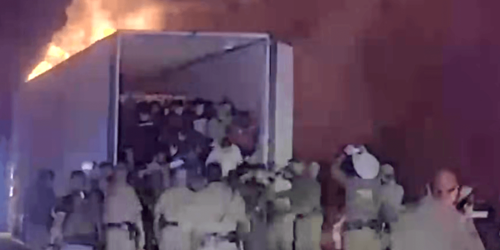 Video reveals police removing 39 undocumented immigrants from a burning tractor trailer during a chase.