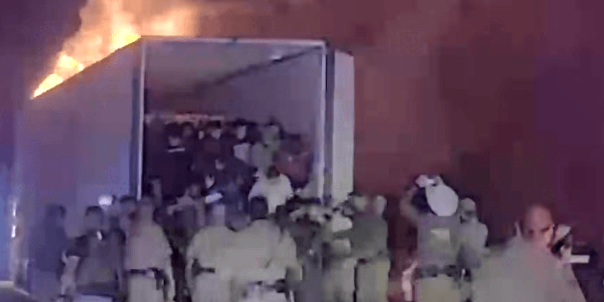 Video reveals police removing 39 undocumented immigrants from a burning tractor trailer during a chase.
