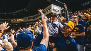 West Virginia's dramatic walk-off leads to heartfelt 'Country Roads' celebration that captures the essence of college sports