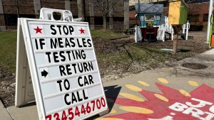 Why did Michigan relax rules for parents seeking vaccine exemptions?