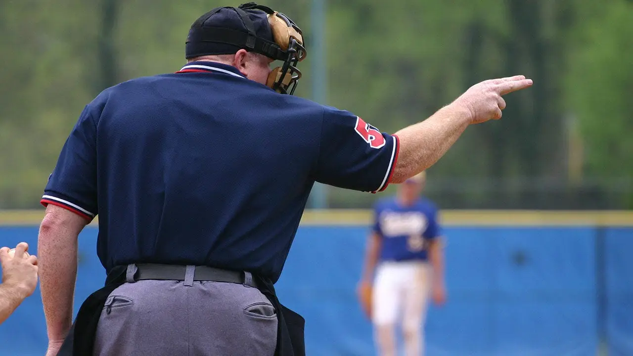 Youth softball coach and umpire clash in heated exchange during Arkansas tournament.