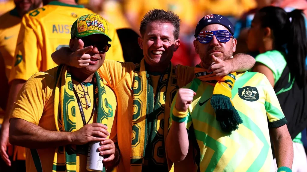 Australian soccer fans filled a Texas Walmart chanting 'We're getting deported' while being escorted out by police.