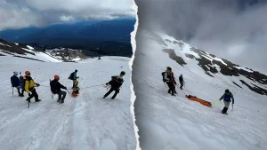 Climber on Mount Shasta survives a 1,500-foot slide while waiting for rescue due to weather delays.