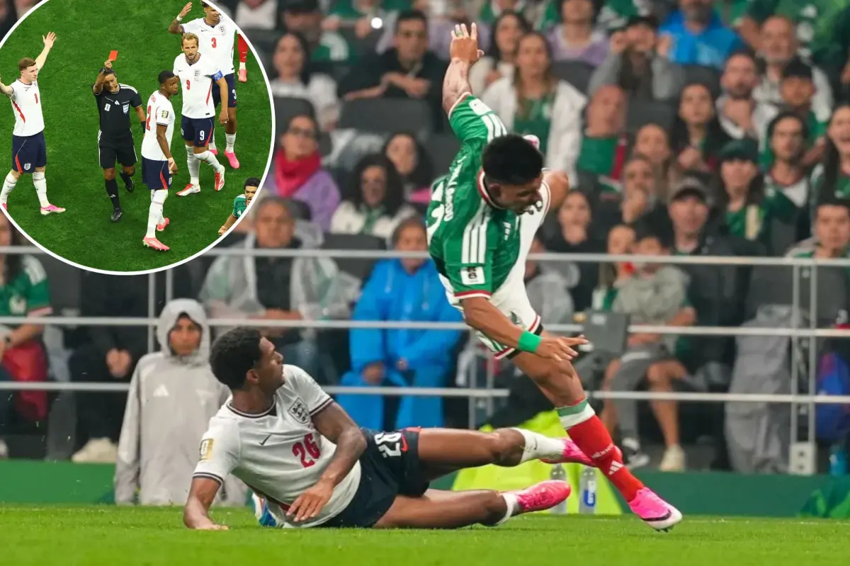 Jarrell Quansah from England receives a red card following FIFA's controversial decision on Folarin Balogun