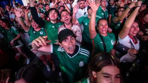 Mexican soccer fans celebrate their World Cup advancement with spontaneous boxing matches.