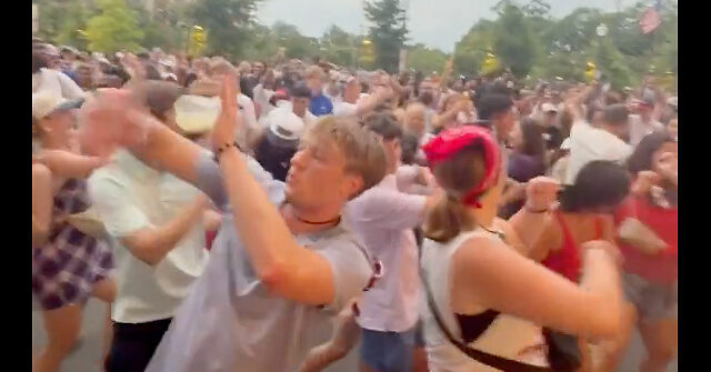 See Americans Celebrate in D.C. Streets While Weather Poses Risk to 4th of July