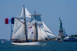 Ships from various nations navigate the Hudson River for the America 250 celebration