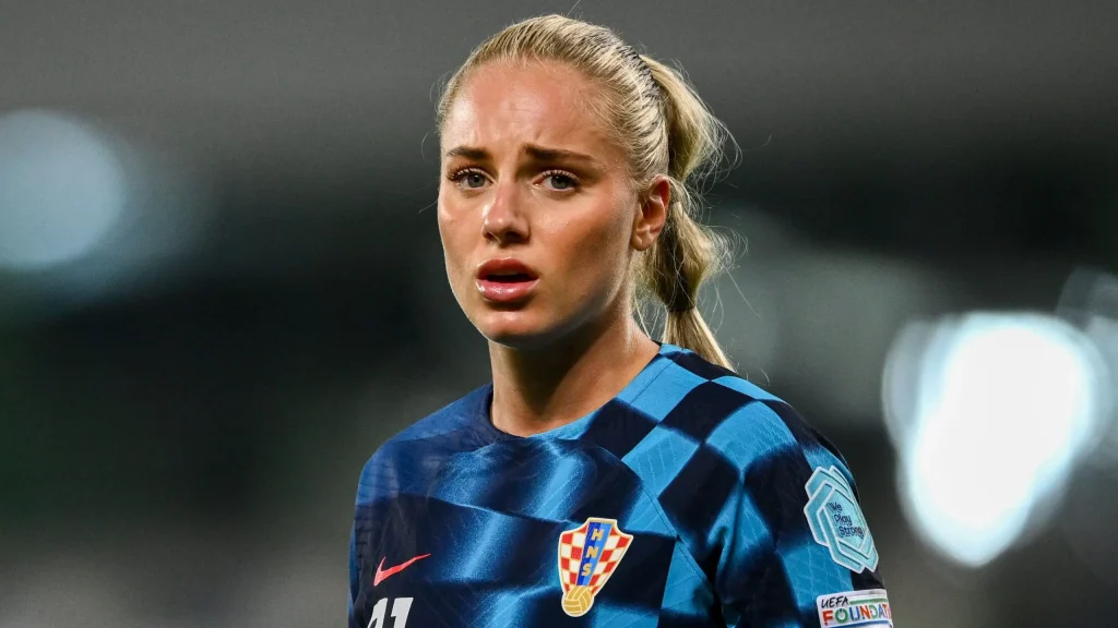 World Cup causes rift for soccer couple; she is eliminated and he is sent to the couch.