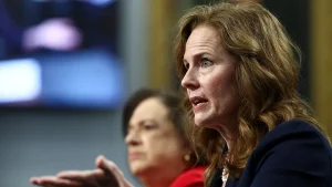 Amy Coney Barrett states that threats and swatting affected her children.