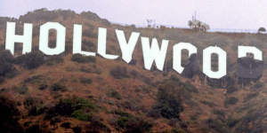 Another $30 billion may depart California as the state hinders a major corporate merger.