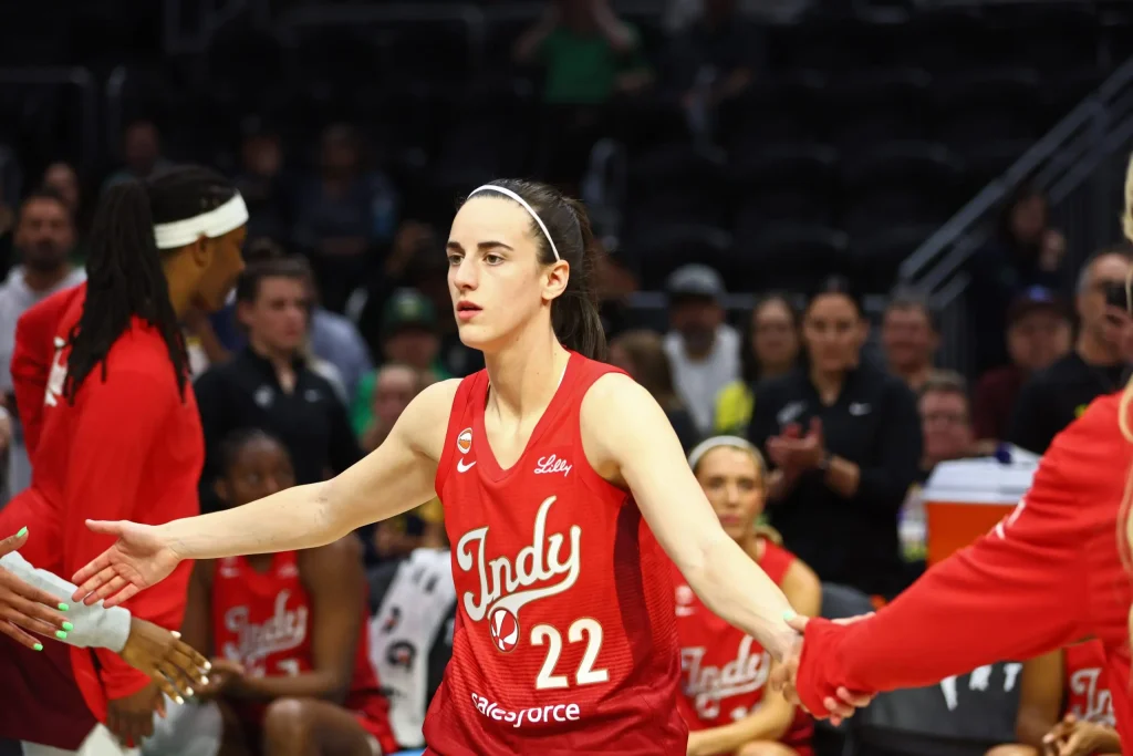 Caitlin Clark scores 32 points as Fever defeat Storm to finish season-series sweep.
