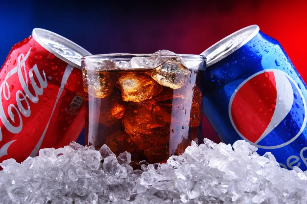 Coke outperforms Pepsi on Wall Street as expensive snacks hurt stock prices.