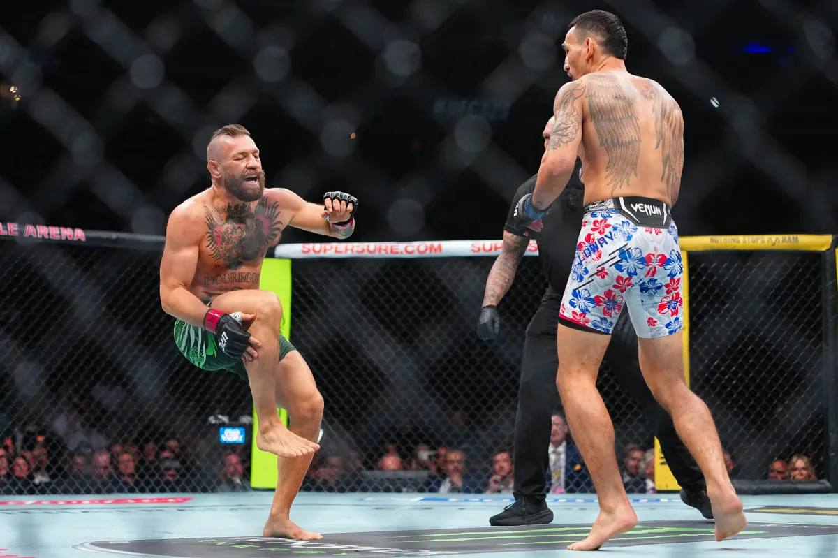 Conor McGregor suffers leg injury in fast defeat to Max Holloway in UFC 329 and faces boos from the crowd