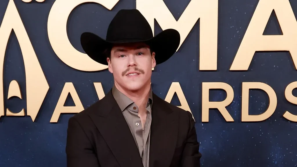 Country artist Zach John King postpones two weeks of performances to mourn his father's passing.