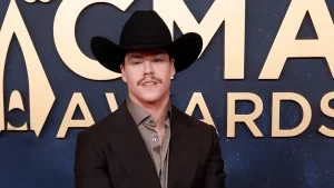 Country artist Zach John King postpones two weeks of performances to mourn his father's passing.