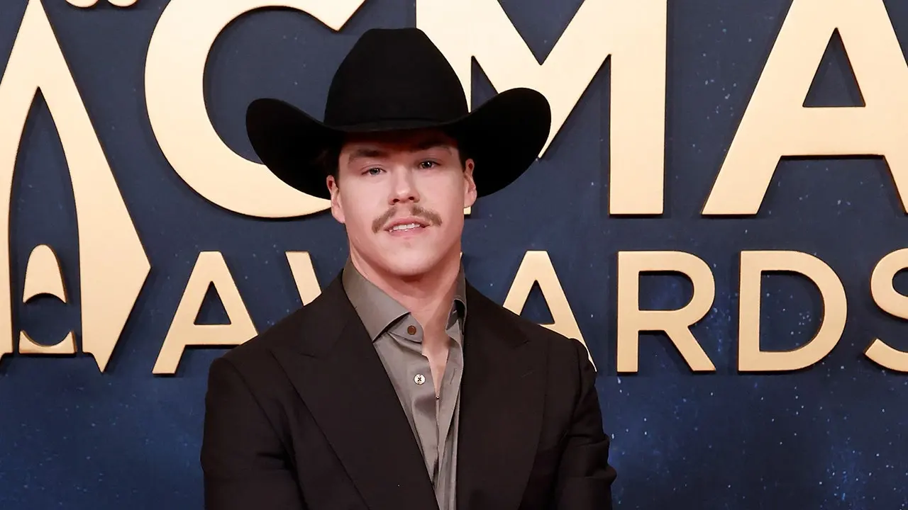 Country artist Zach John King postpones two weeks of performances to mourn his father's passing.