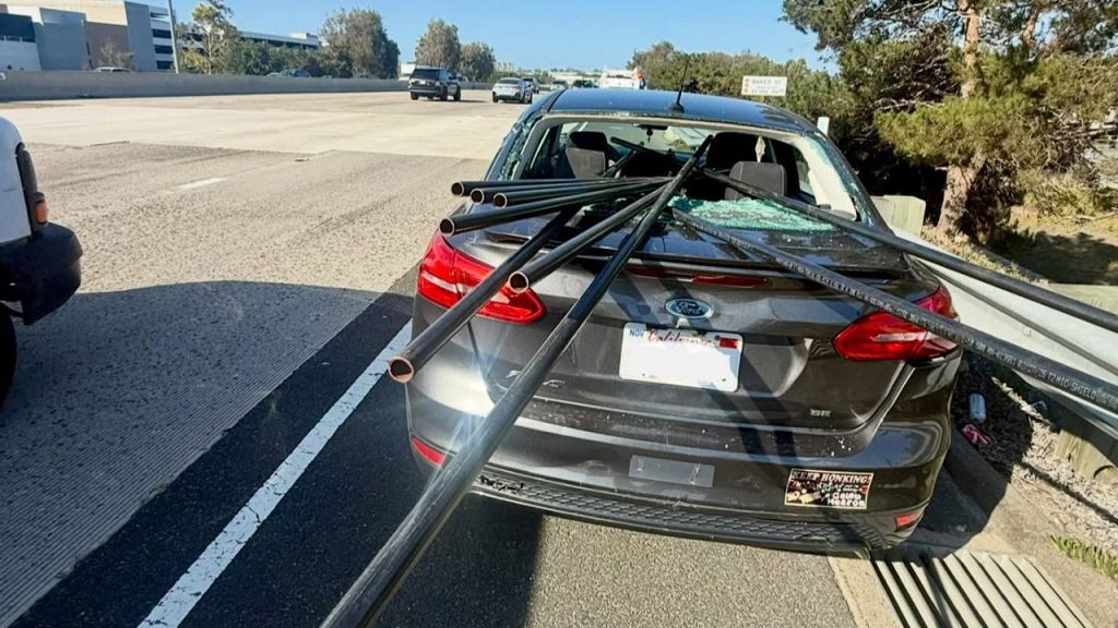 Driver in California survives after metal pipes go through car in highway accident