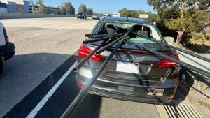 Driver in California survives after metal pipes go through car in highway accident