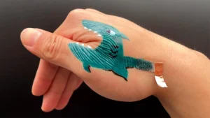 Electronic tattoo from Penn State monitors heart activity and manages robotic hand