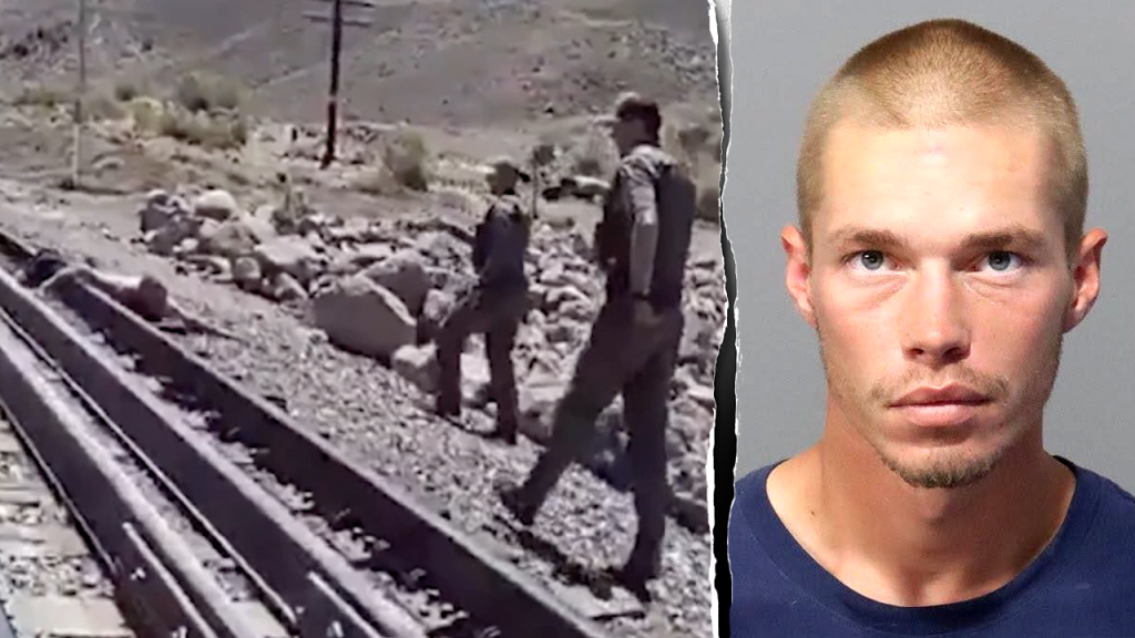 Footage reveals captured inmate located on railway tracks following a tip from the public