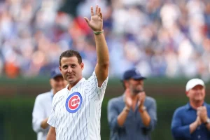 Former Cubs player Anthony Rizzo hits a home run in the Wrigley Field bleachers.