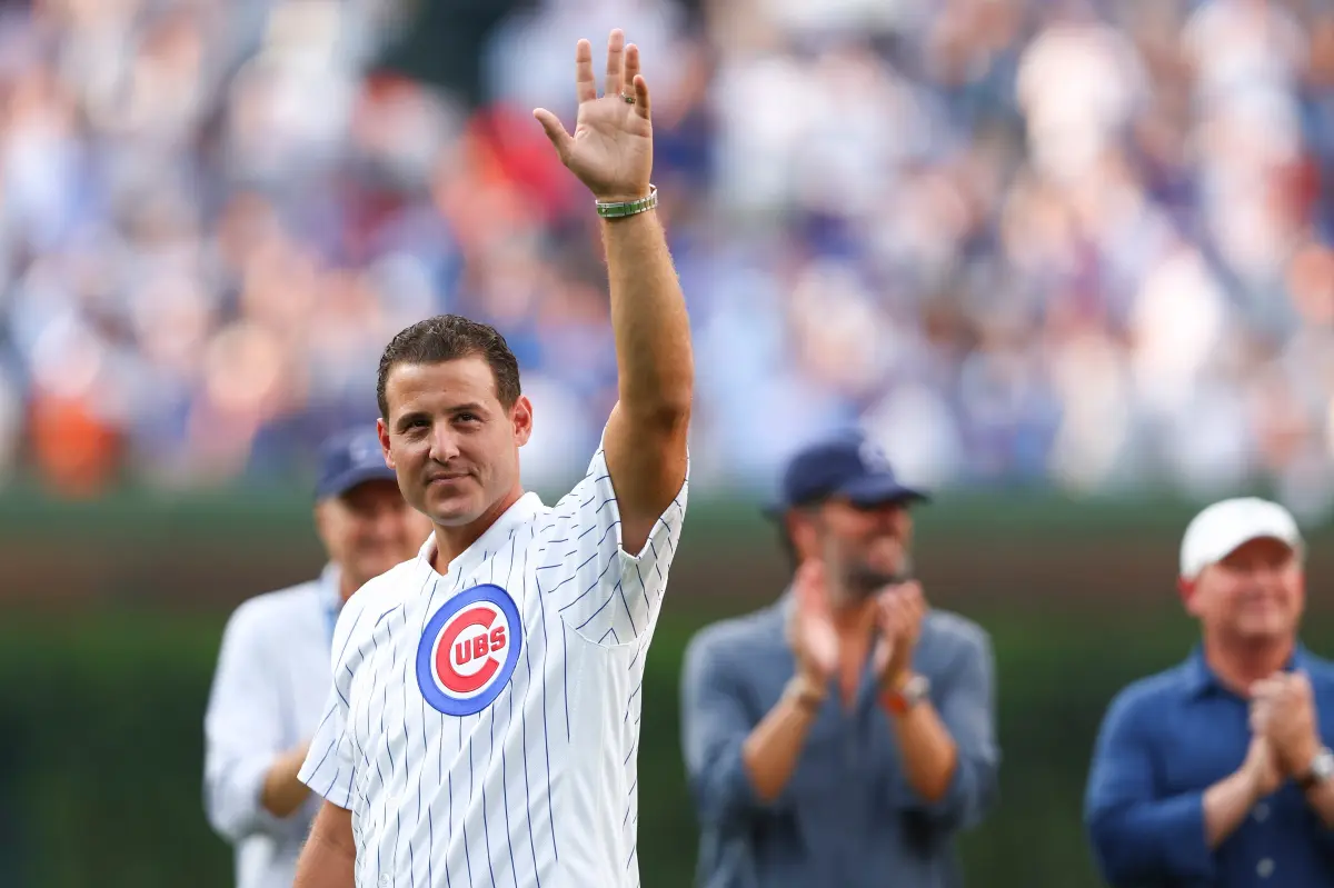 Former Cubs player Anthony Rizzo hits a home run in the Wrigley Field bleachers.