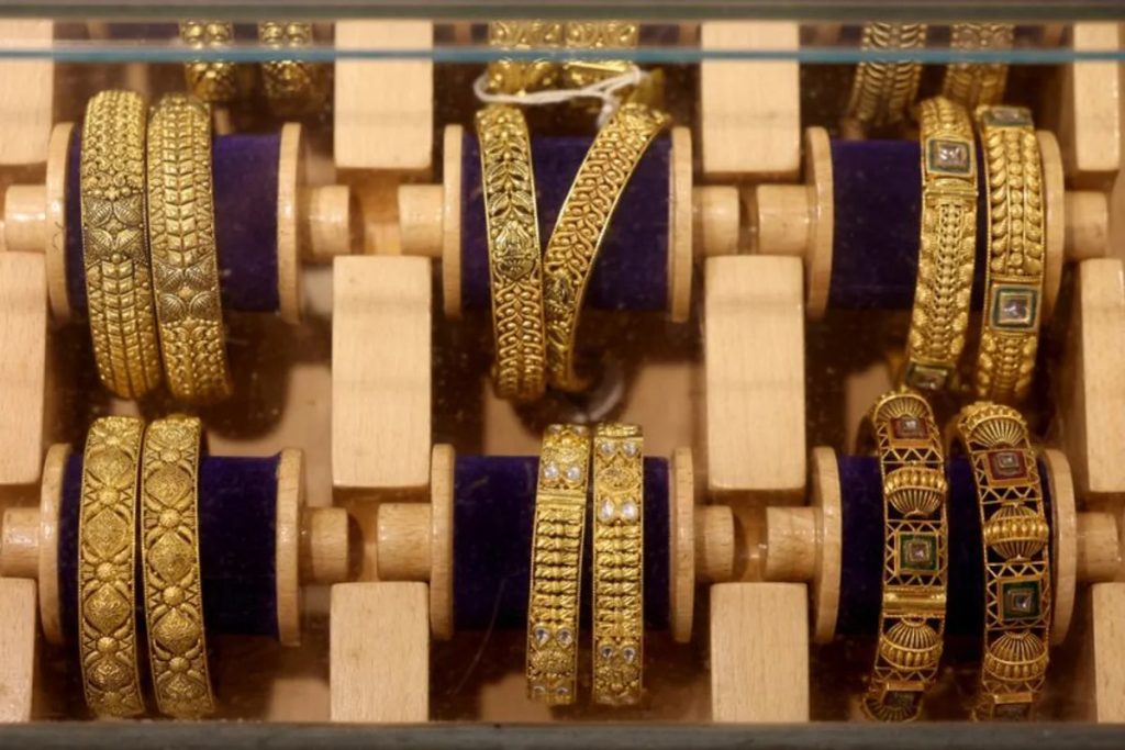 Gold declines as rising oil prices keep inflation and interest rate concerns in focus