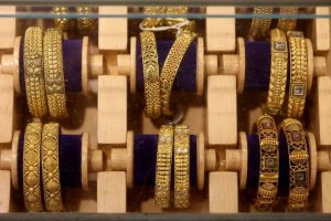 Gold declines as rising oil prices keep inflation and interest rate concerns in focus