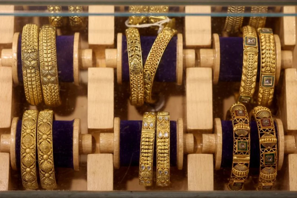Gold declines as rising oil prices keep inflation and interest rate concerns in focus