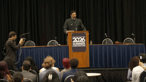 Hasan Piker dons a Mao-inspired outfit at the College Democrats event.
