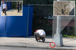 Homeless people connect electricity to the expanding Intrepid Museum camp in NYC.