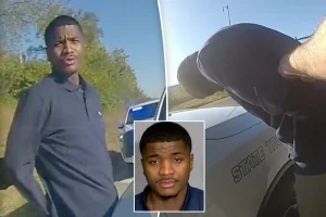 Intense scene as police point guns at NBA rookie Kam Jones following a highway pursuit