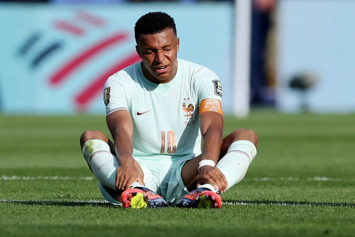 Kylian Mbappé talks about injury worries after France's quarterfinal victory.