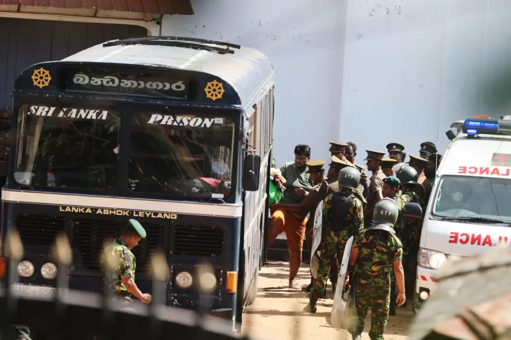 Large fight at Sri Lanka prison results in at least 26 fatalities and 77 injuries.