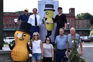 Mr. Peanut attends the grand opening celebration at Peoples Security Bank & Trust.