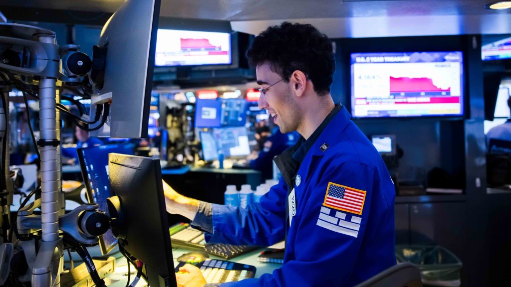 Nasdaq futures surge as a significant week of earnings and a Federal Reserve meeting approaches: Live updates