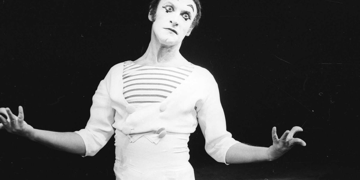 Oily mime accused of bothering park employees collapses in court