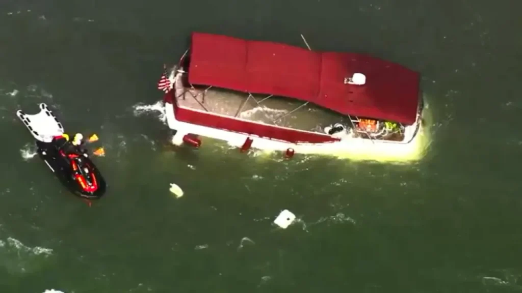One person has died and three others are missing after a boat overturned in the San Francisco Bay near Alcatraz.