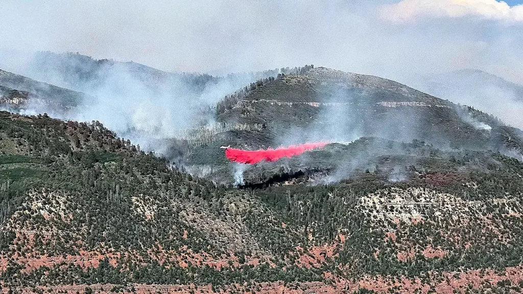 Pilot dies in firefighting plane crash into reservoir during Gold Mountain Fire
