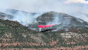 Pilot dies in firefighting plane crash into reservoir during Gold Mountain Fire