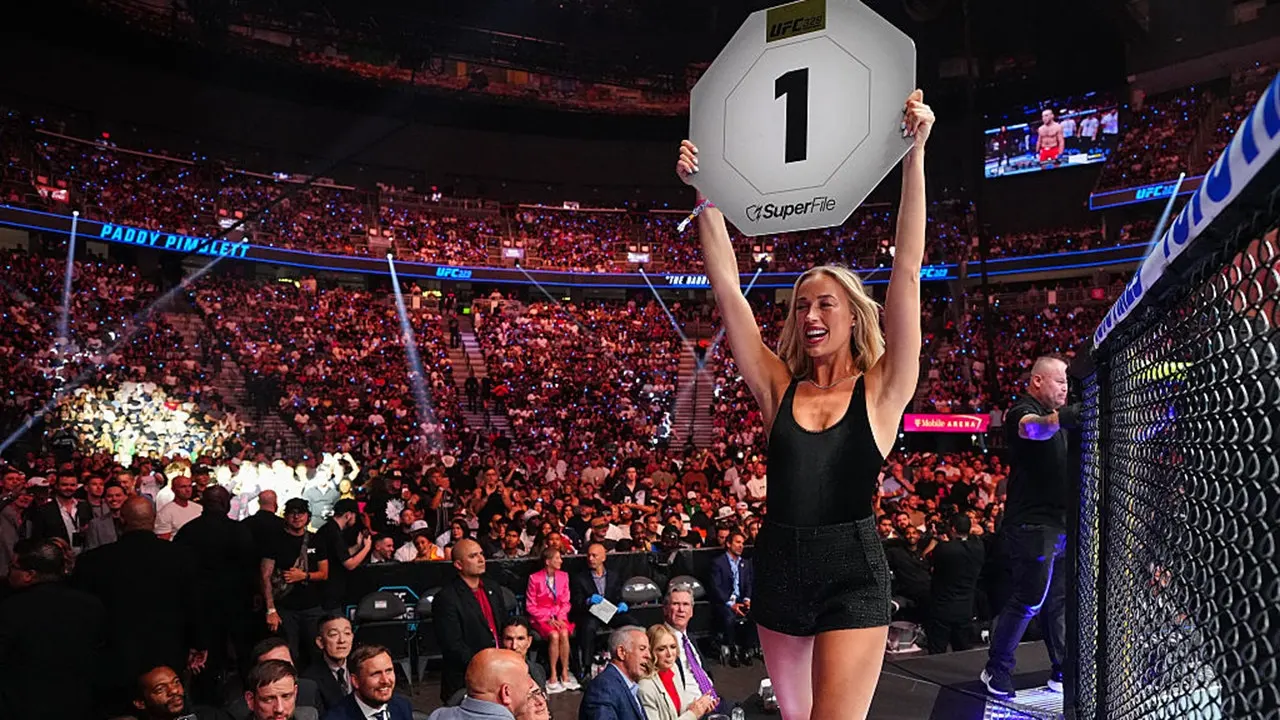 Sophie Cunningham takes off her shoes and enters the Octagon at UFC 329 as an unexpected ring girl