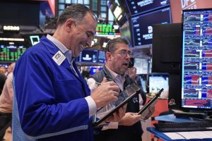 Stocks move up on Wall Street as oil prices fluctuate.