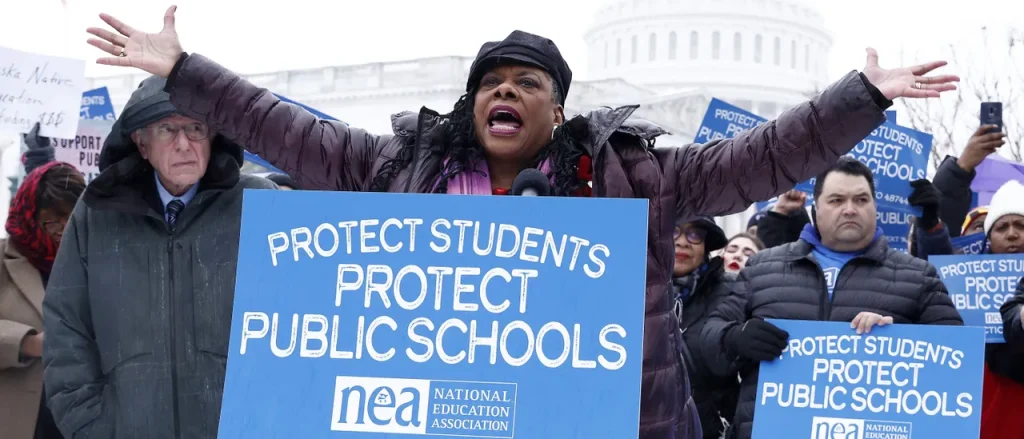 The Largest Teachers Union in the U.S. Decides to Keep Supporting Anti-ICE Efforts and Elects a Socialist Leader
