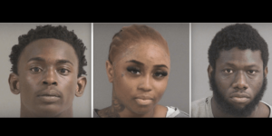 Three adults and four children face charges for possessing a machine gun, stealing a Taser, and assaulting police during a July 4 attack on female officers.