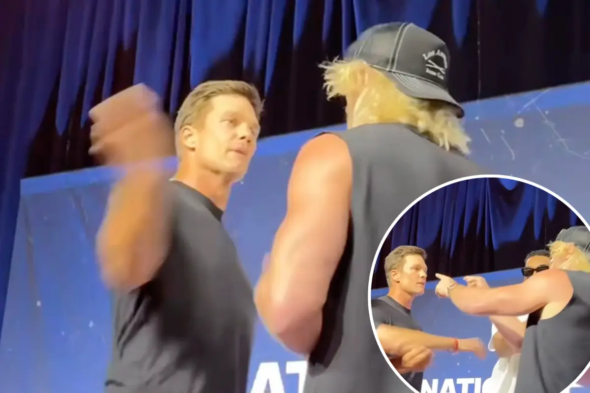 Tom Brady smacks 'dork' Logan Paul while Karl-Anthony Towns steps in during chaotic Fanatics Fest event.
