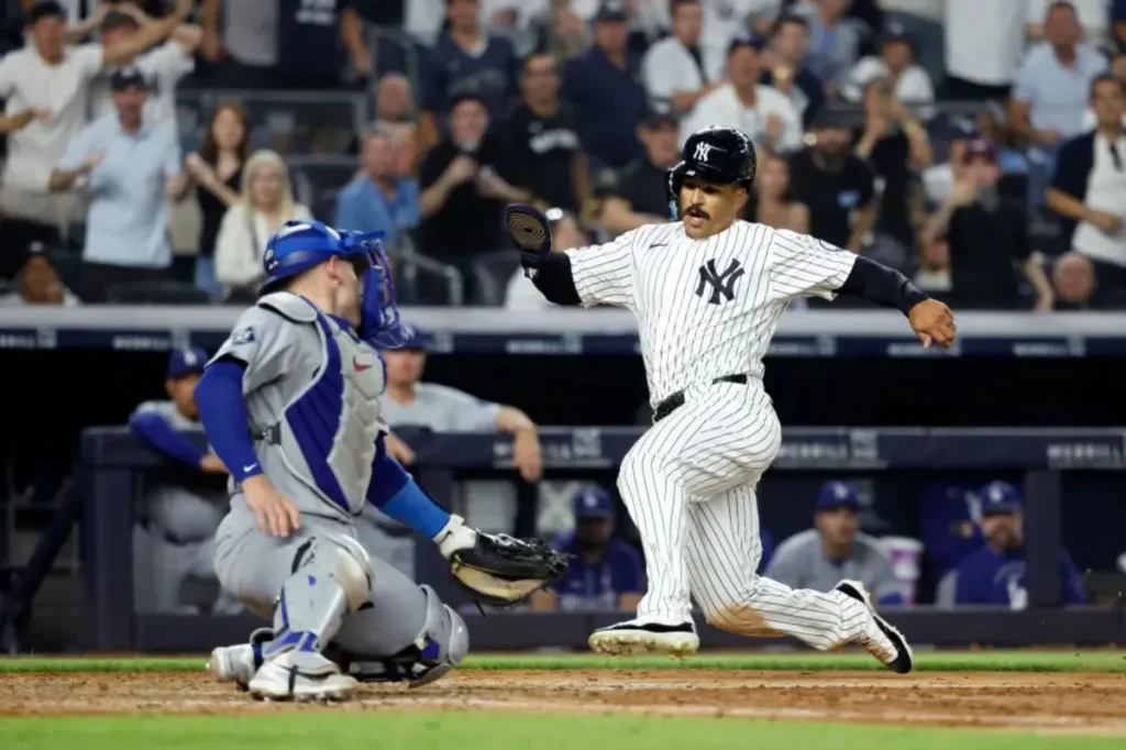 Trent Grisham of the Yankees is tagged out at home in a crucial situation
