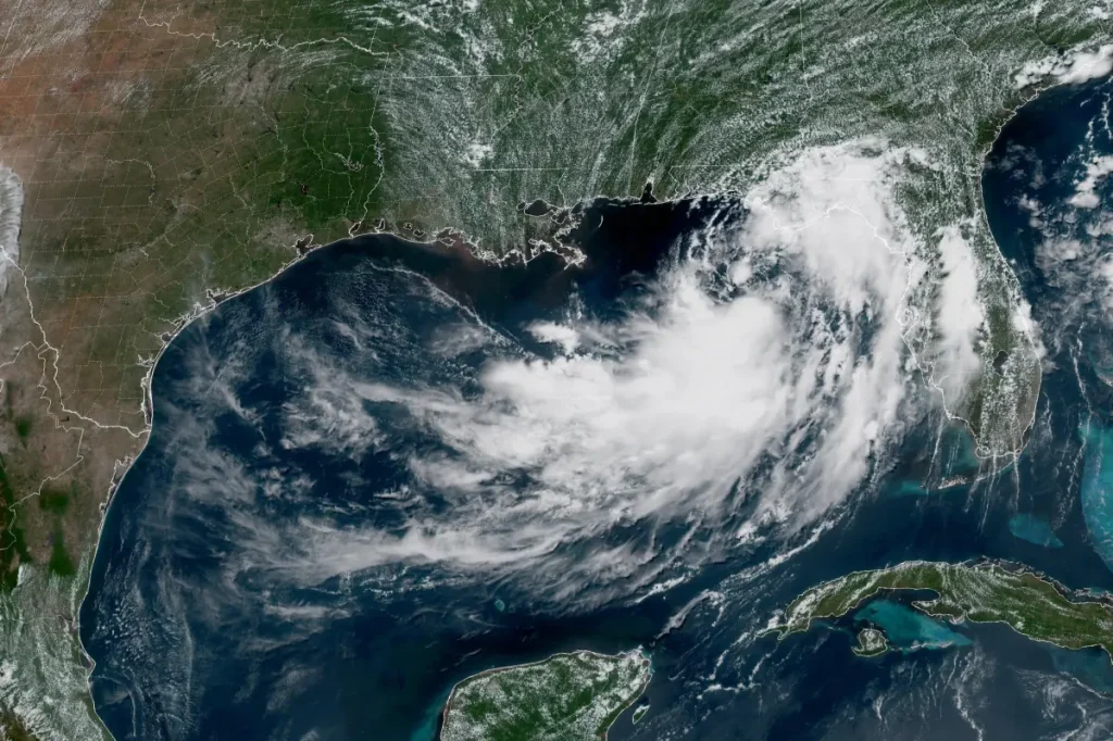 Tropical Storm Bertha moves closer to shore as Hurricane Fausto develops in the eastern Pacific.