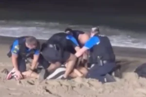 Virginia Beach officer avoids a wild karate move while pursuing a martial arts expert in popular video