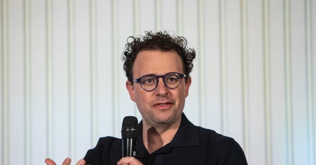 AI Companies Need to 'Genuinely Cure Cancer' to Earn Public Trust, Says Anthropic CEO Dario Amodei